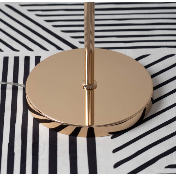 Lámpara de pie de metal dorado con bola de color ámbar