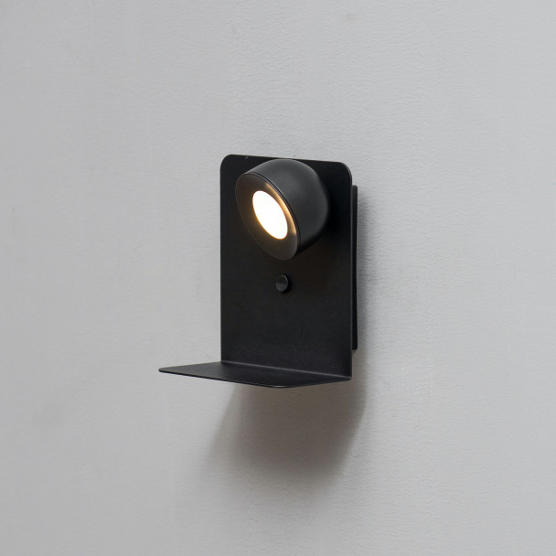 Lámpara de pared con soporte para teléfono
