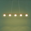 Luminaria dorada larga ideal sobre una mesa - Nysséa
